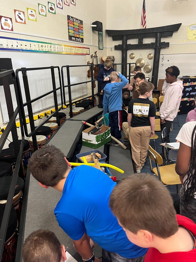 Students are working together on a project in music class 