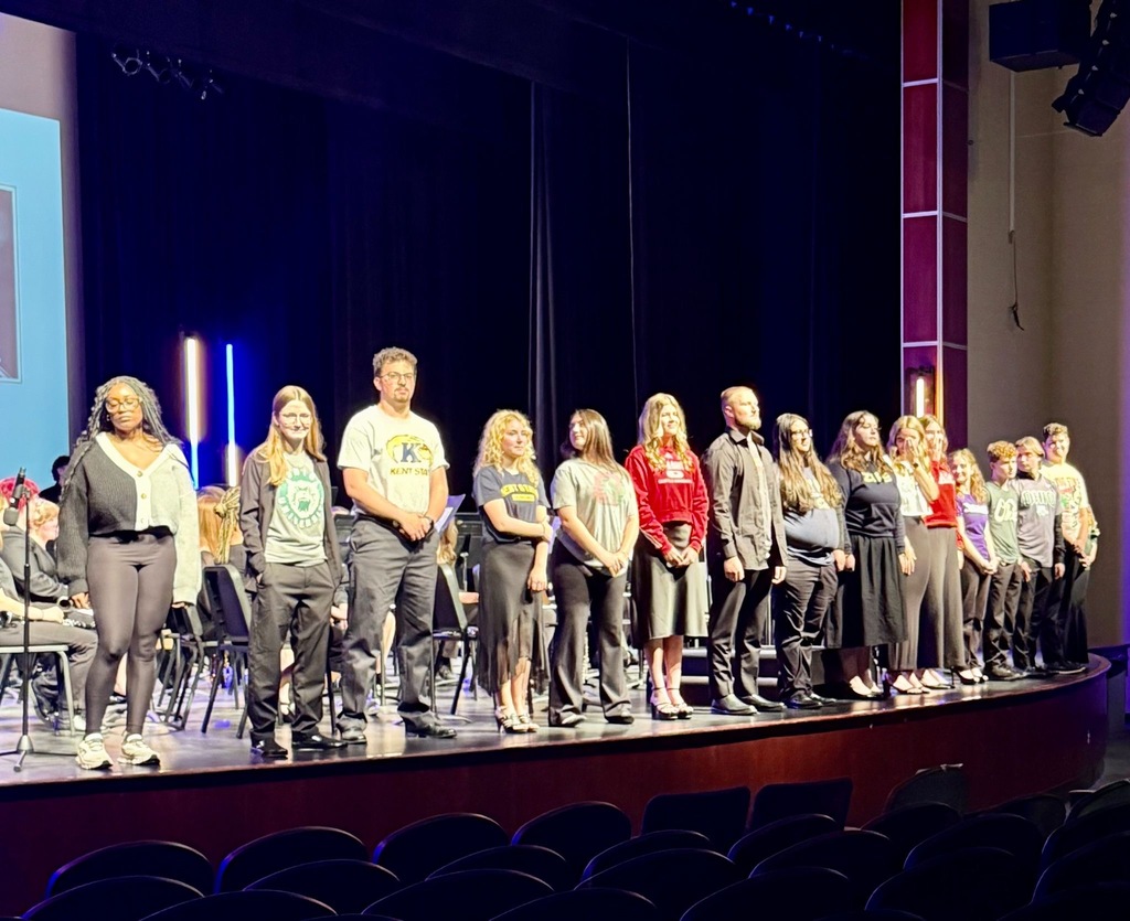 Streetsboro band is on stage playing their instruments 