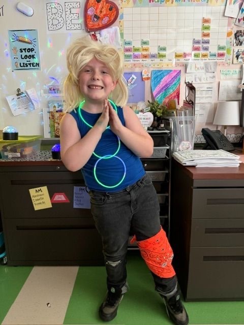 First grade students showcased their school spirit by enjoying an 80’s day this week.  We think they “nailed it”!  Our families also continued to visit and read stories to our students as part of Rockets Read Together.  This is the best time of year to enjoy reading, family, and friendship!
