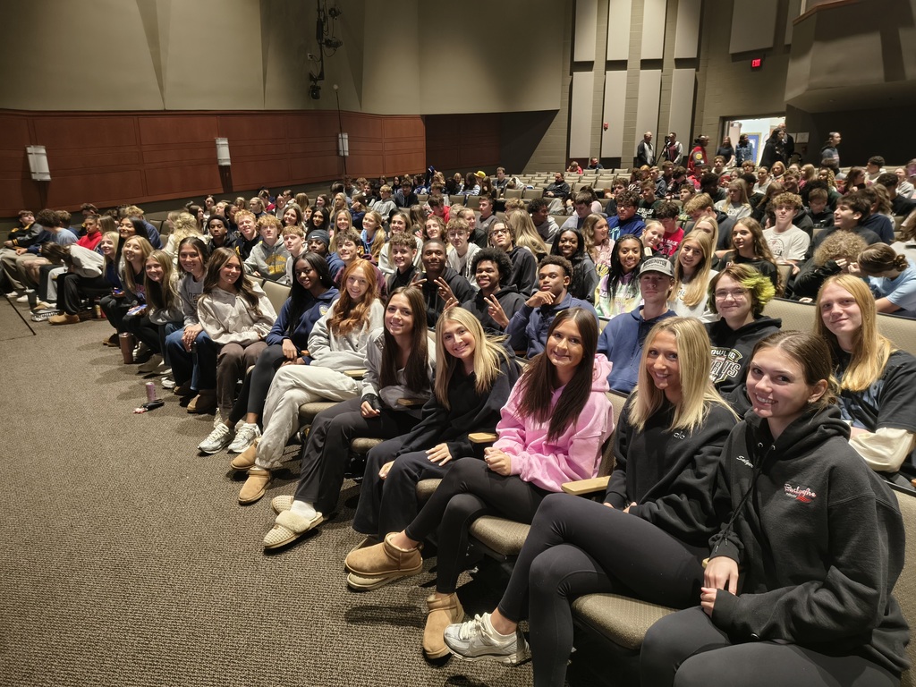Streetsboro High School student athletes sit in the Streetsboro Performing Arts Center for assembly featuring Ohio State and NFL Wide-receiver Roy Hall.