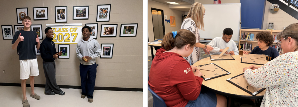 Three students pose in front of the Class of 2027 banner surrounded by framed student photos, while staff and students assemble picture frames at a table nearby.