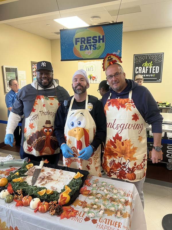 SMS Admin serving Thanksgiving Lunch