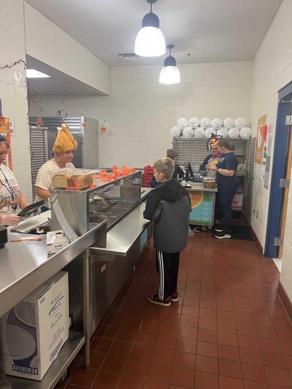 HDI staff serving lunch