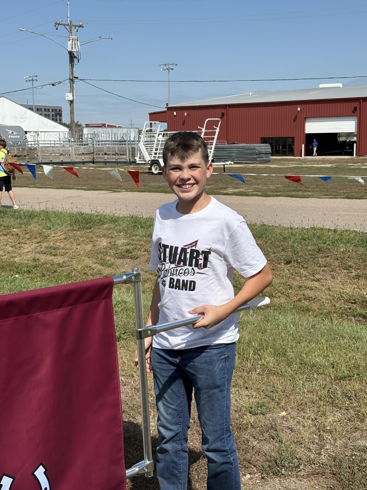 carrying the school banner