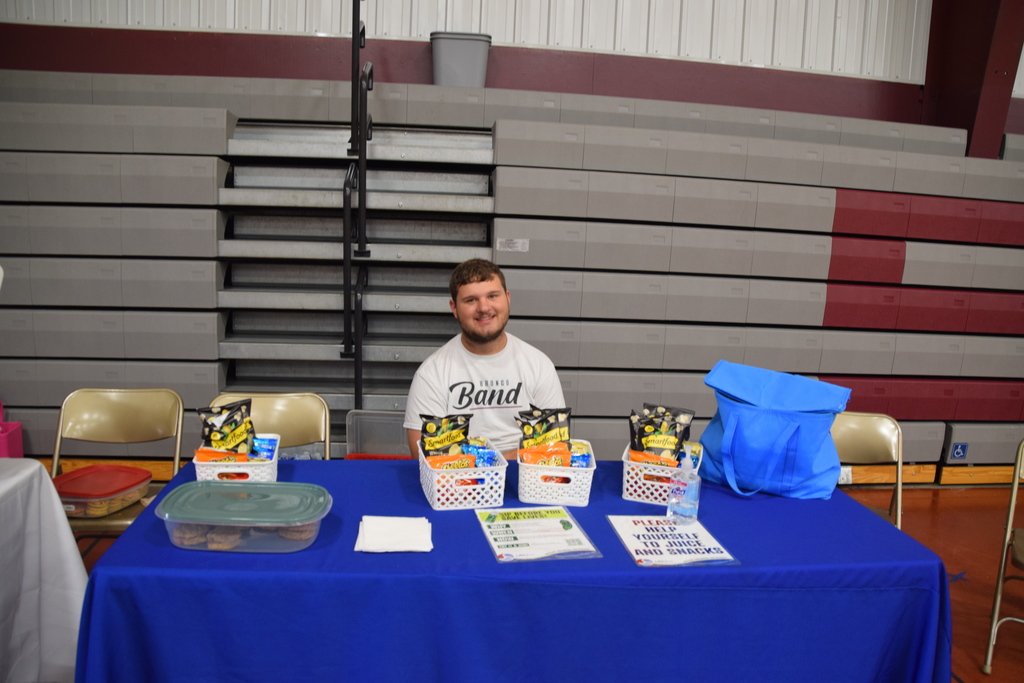Maddux working the snack table.