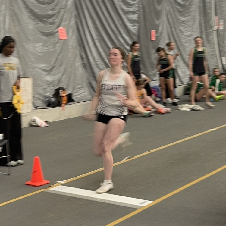 Kember in long jump.  