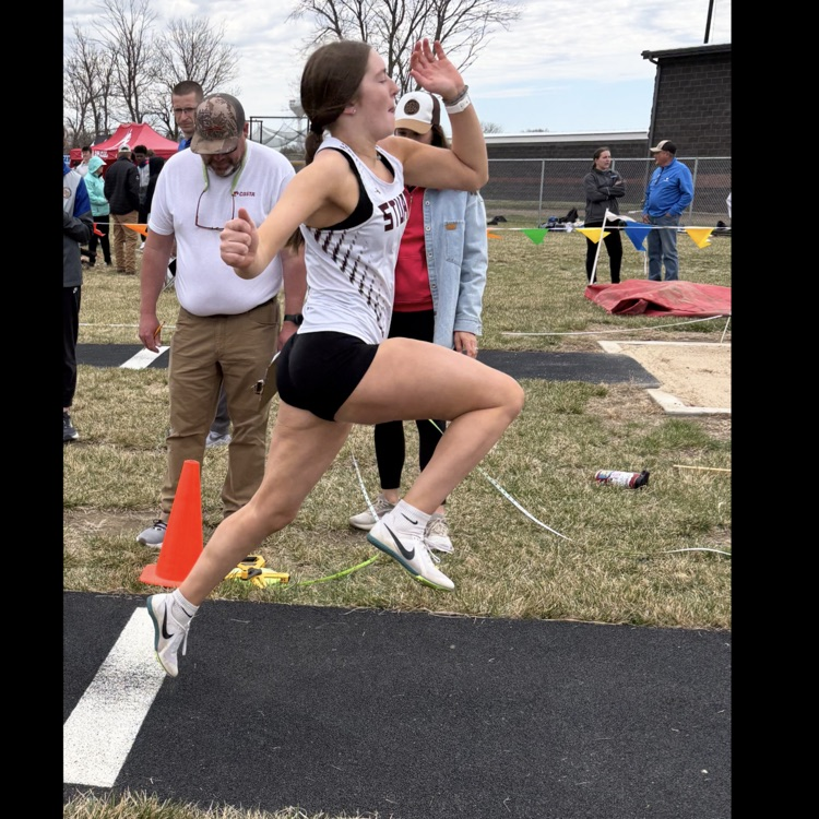 Kember in long jump.  