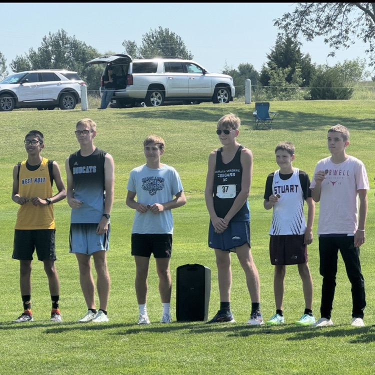The top 6 in the varsity boys race 