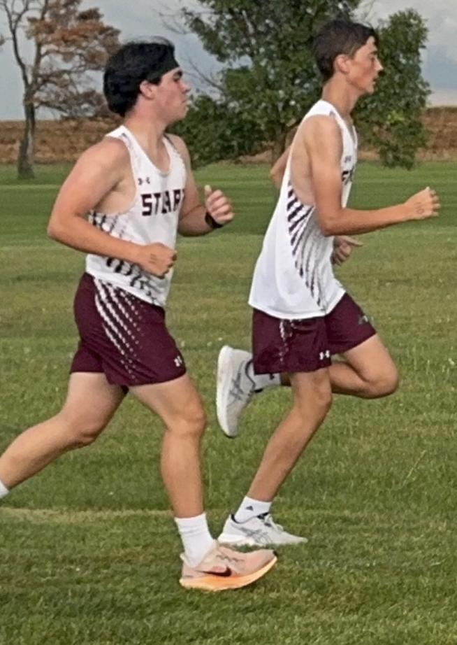 Jake and Jaxon run in the rain