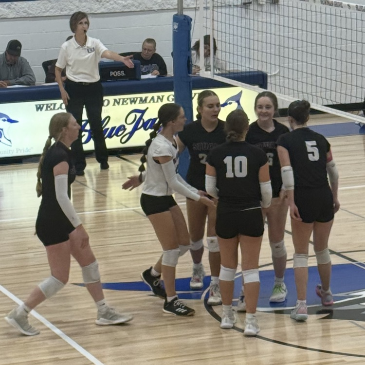 Stuart volleyball celebrates a win.