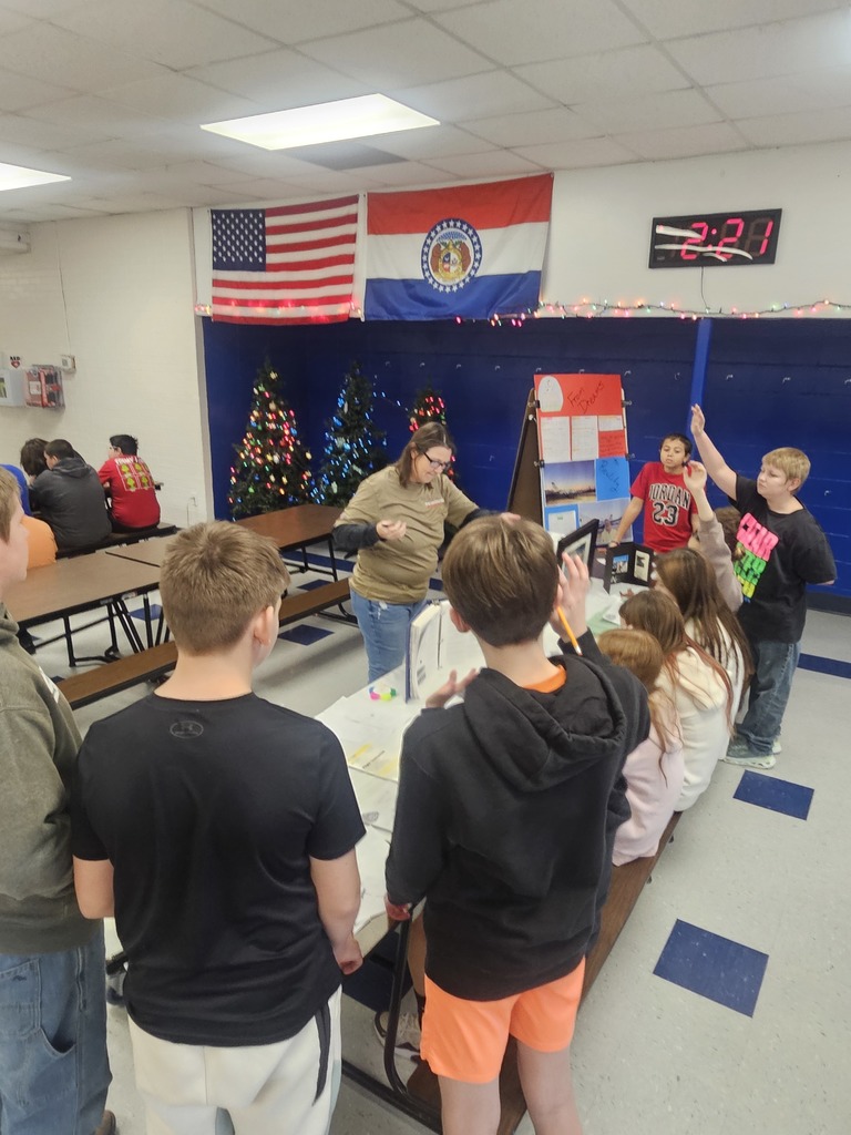 Students listening to a speaker at the career fair.