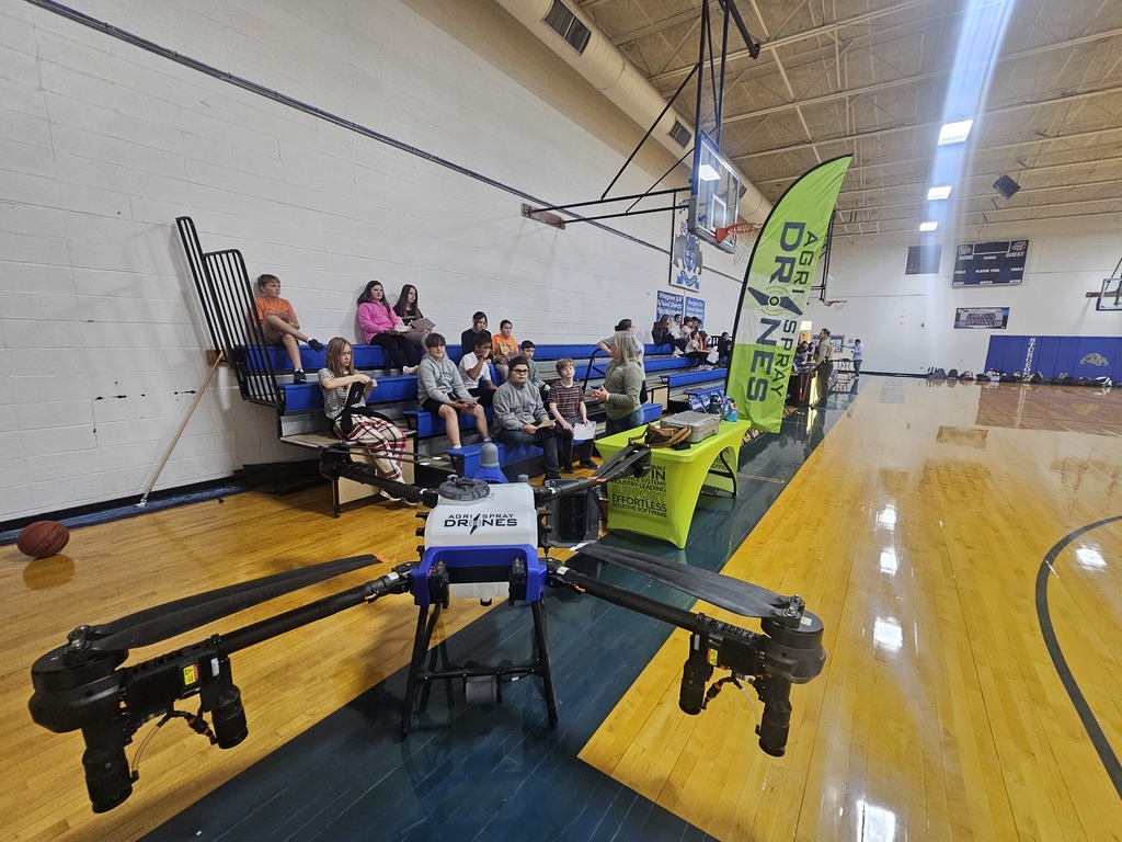 Students listening to a speaker at the career fair.