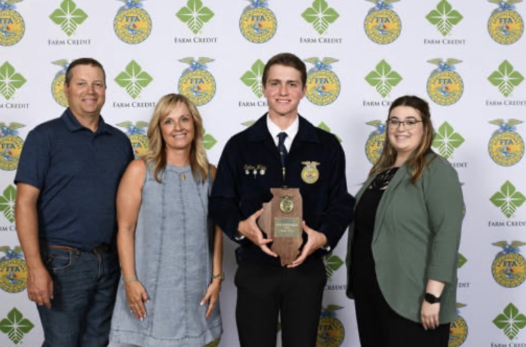 Farm Credit News Room: L-R: Kory Wiley, Tonya Wiley, Kolton Wiley, and Ms. Alex Tungate