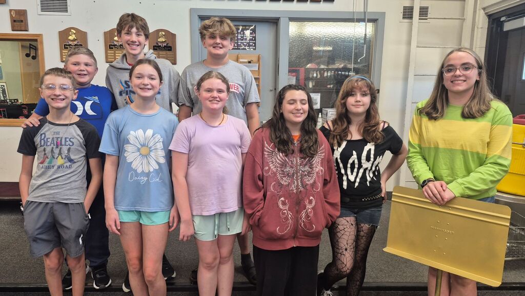 7th & 8th Grade Golden Stand recipient Michaela Blickensderfer and Section of the Week Percussion Section