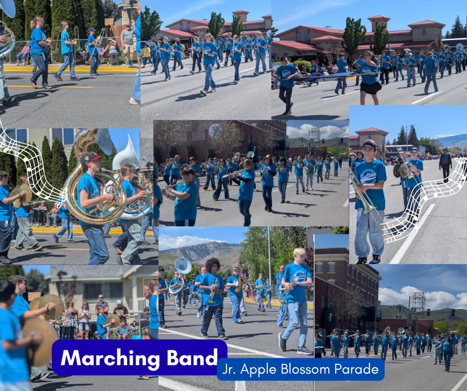 Students walking with instruments on the street in Wenatchee.