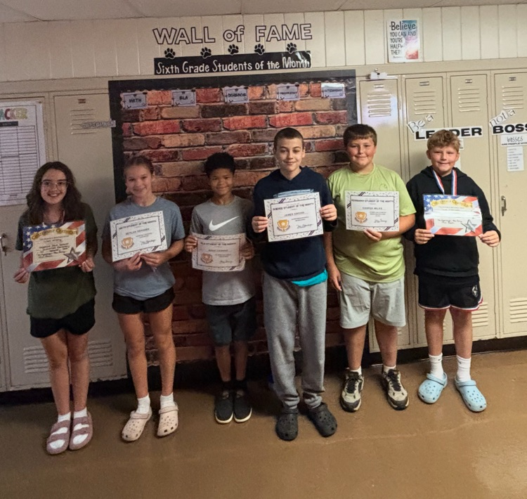 6th grade recipients with teachers.