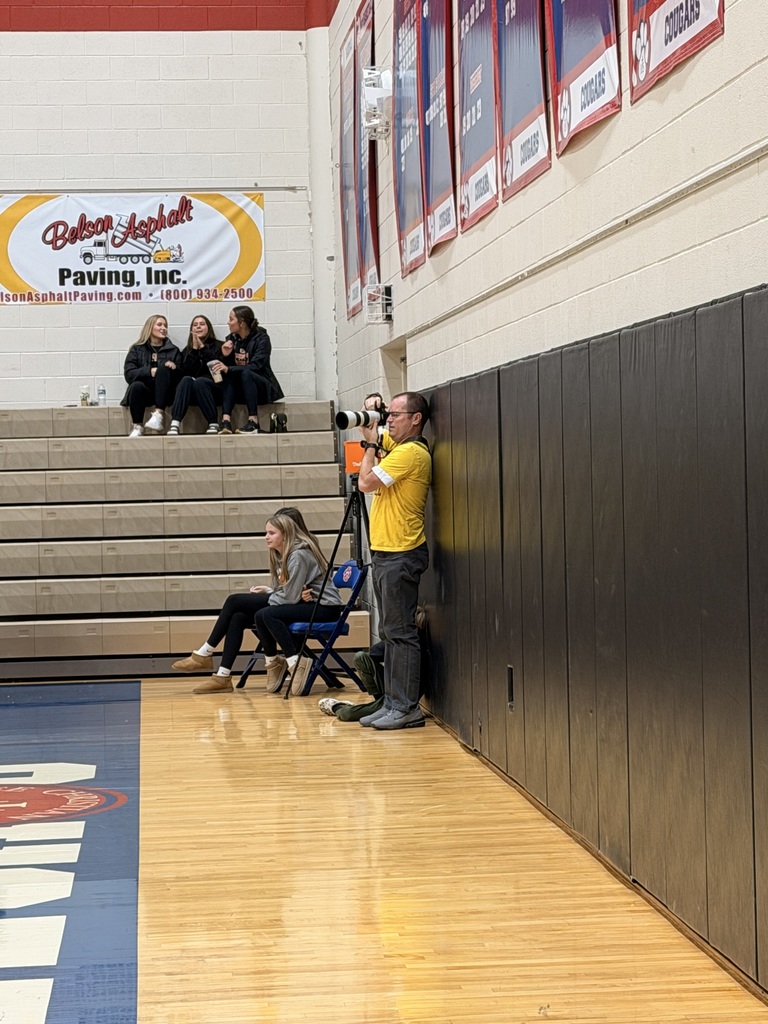 Image of Mr. Westrick taking photographs