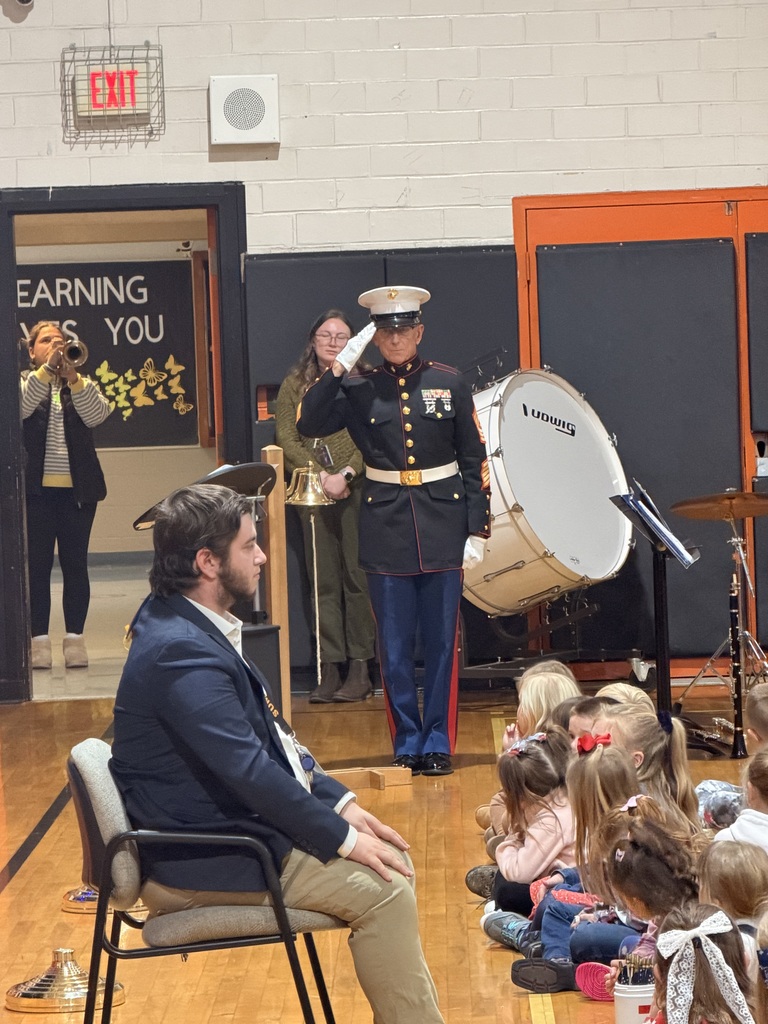Master Sergeant Kosinski saluting