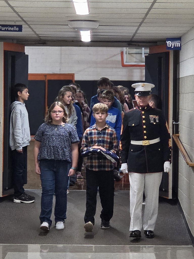 exiting gym to go to flag pole