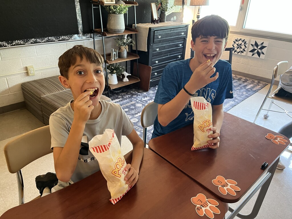 boys eating popcorn