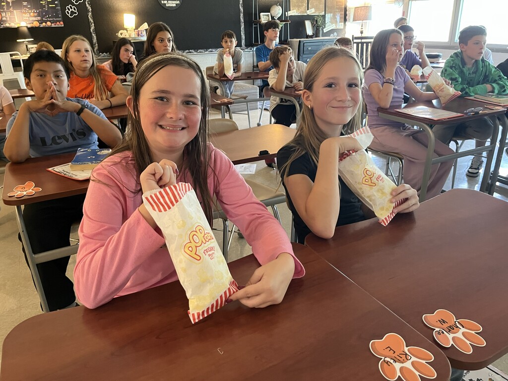 girls eating popcorn