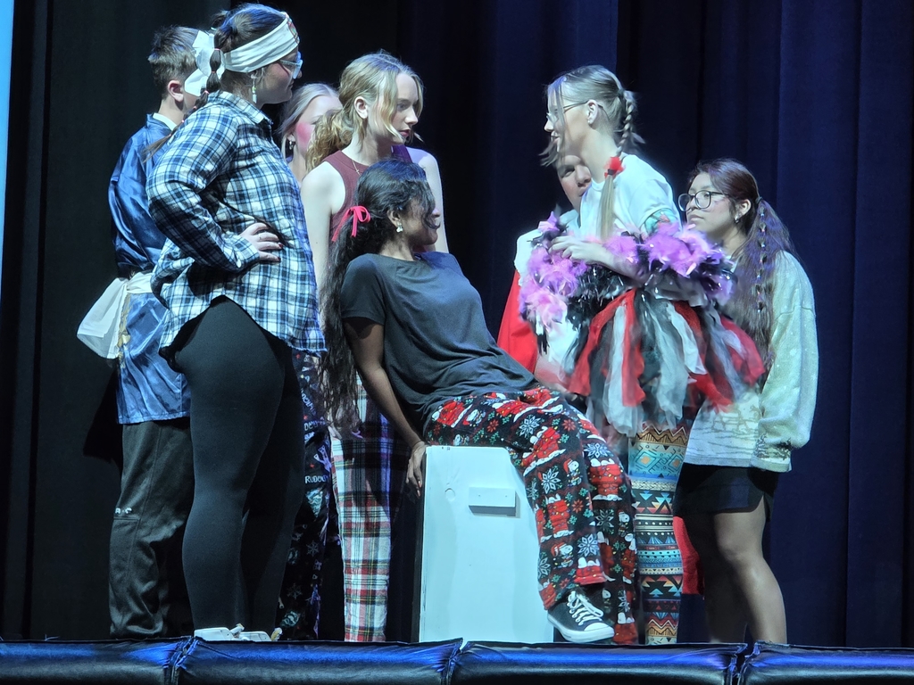 Cast members surround each other with high emotions