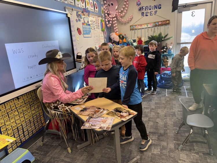  Autographing pictures!