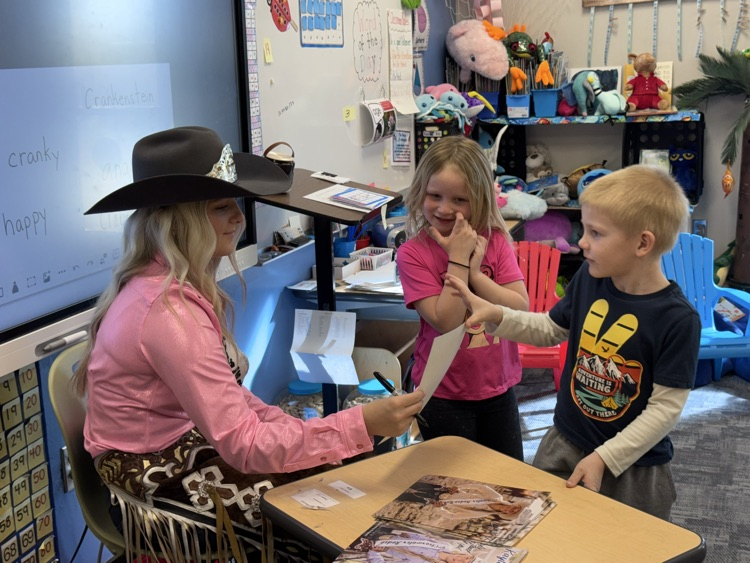 Autographing pictures!