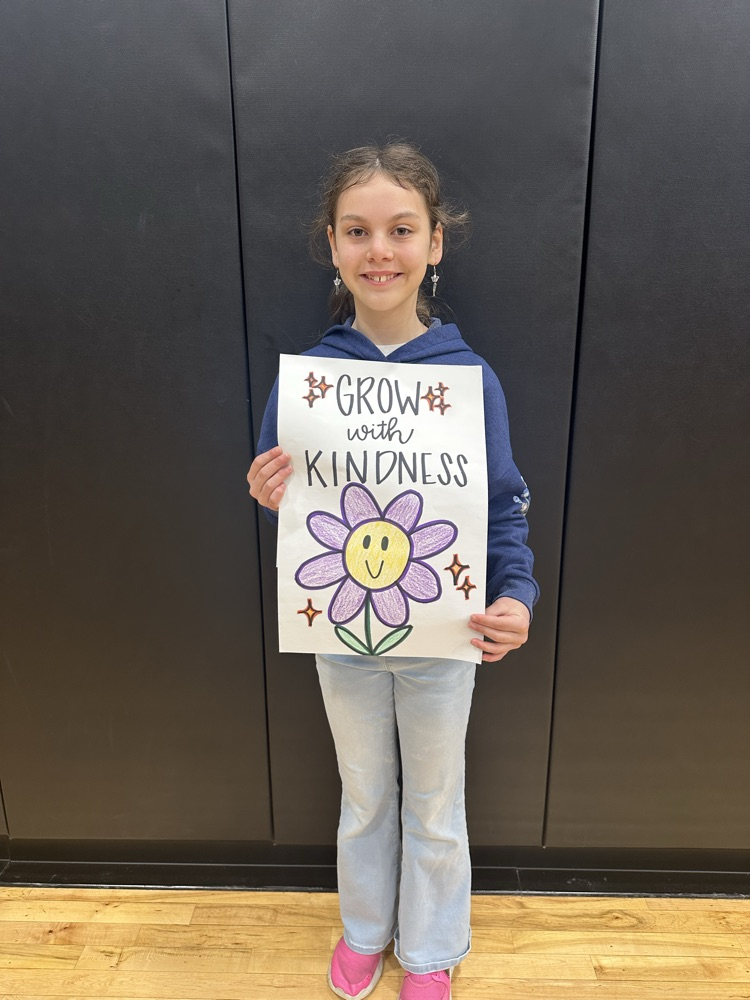 KTQ 04/10 Winner Joslyn holding the quote Grow with Kindness 