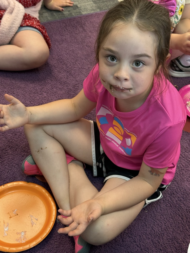 student eating a s’more