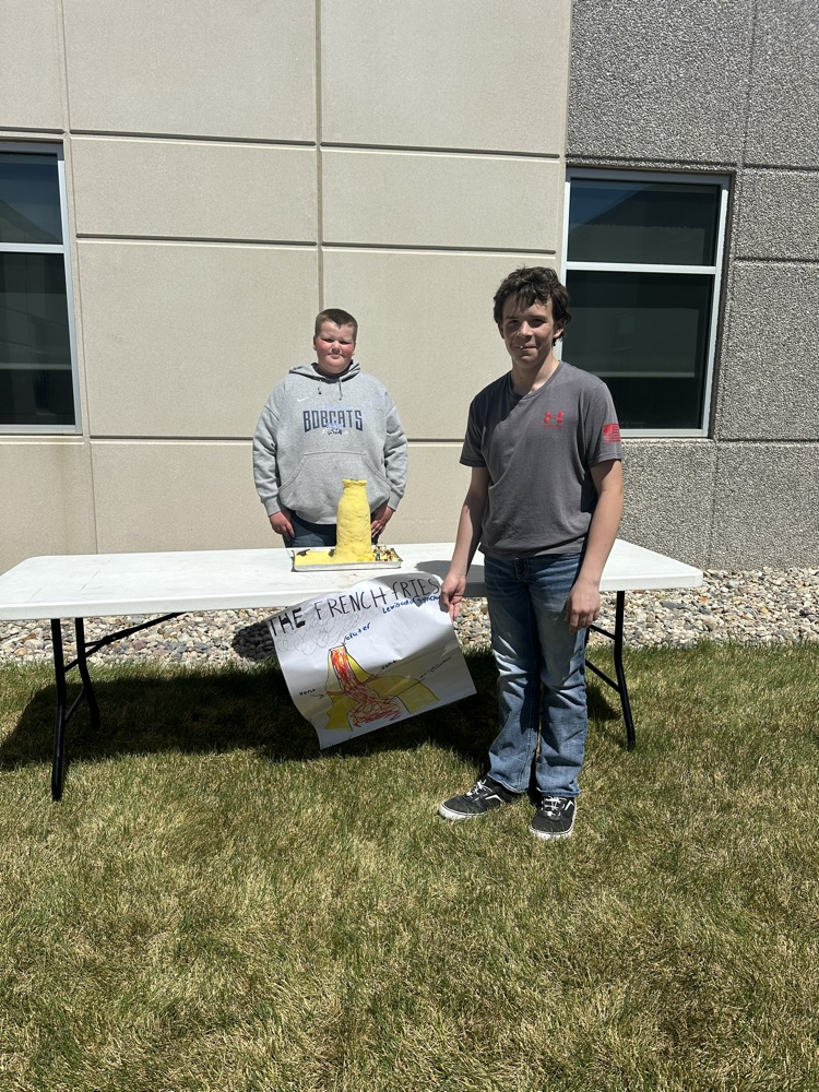A group of students presenting their volcano. 