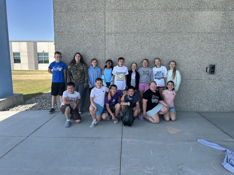 Students with the trash they collected. 