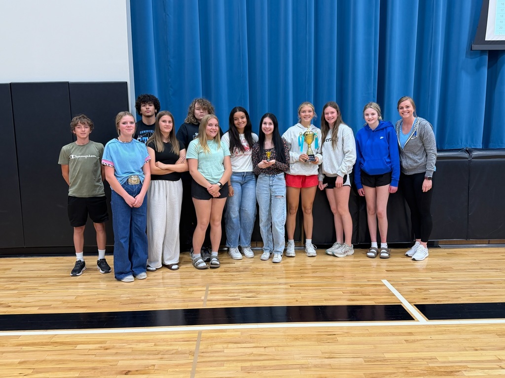Semester 2 Den Champions, the Bluey Den with their trophy.
