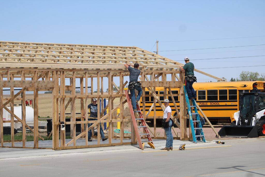 Students on ladders