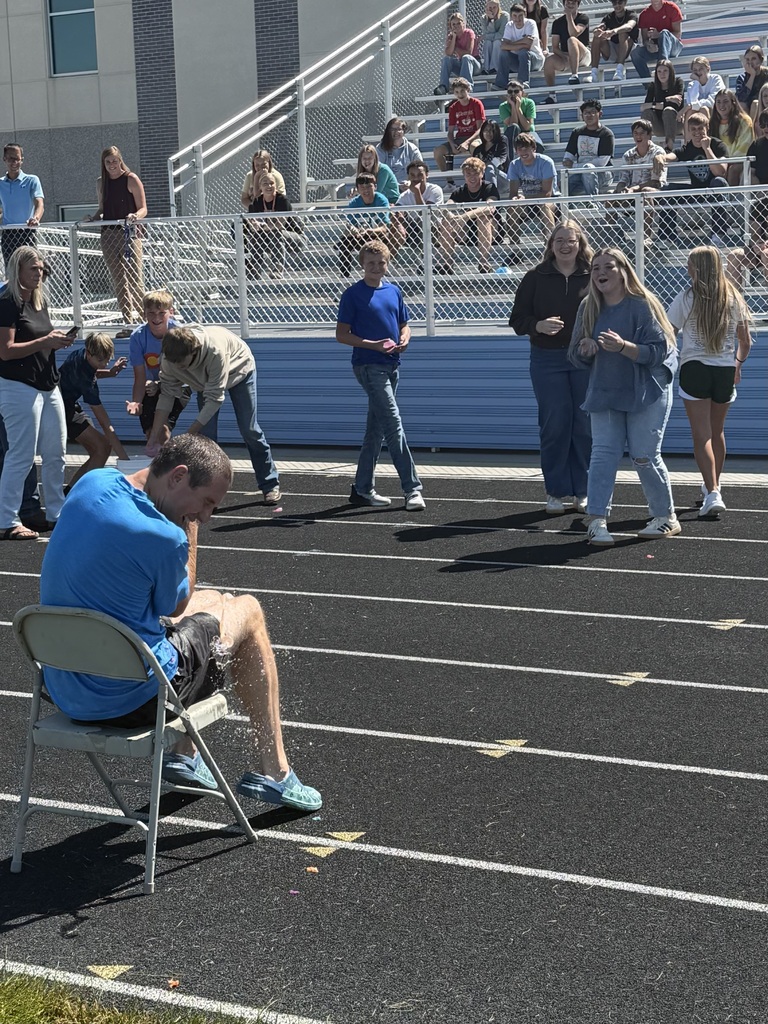 Water balloons being thrown at Mr. Birch