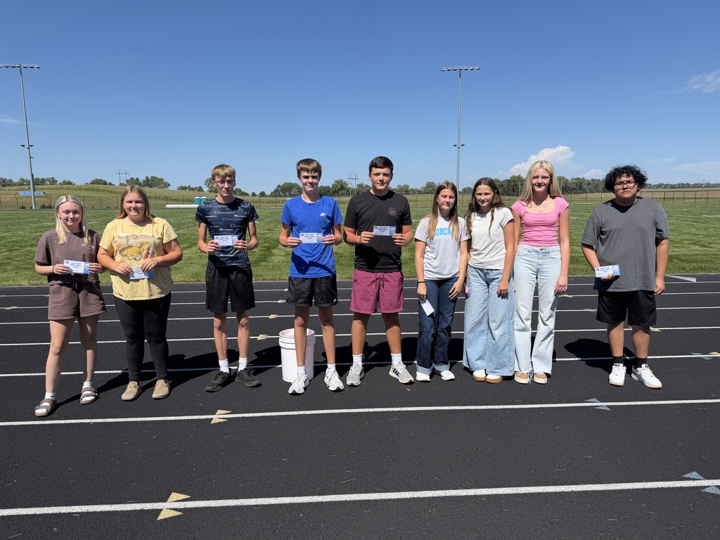 Students holding their free tardy pass
