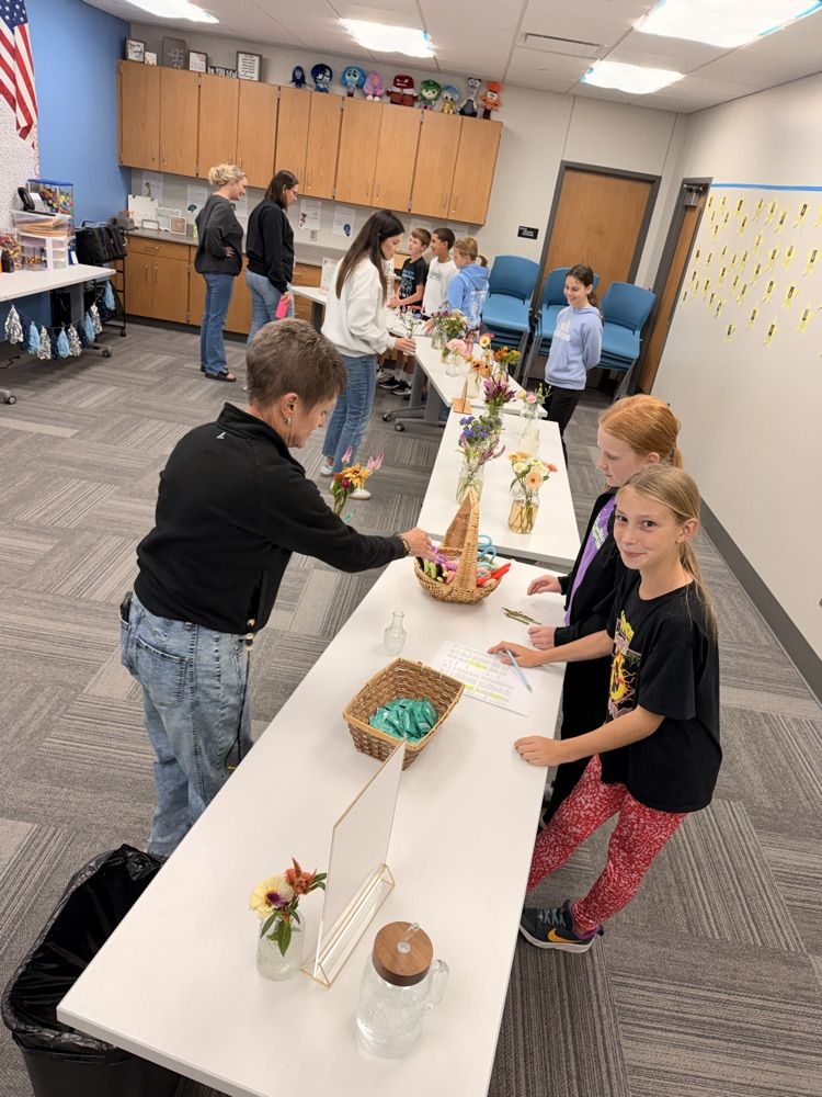 student council helping at bloom bar