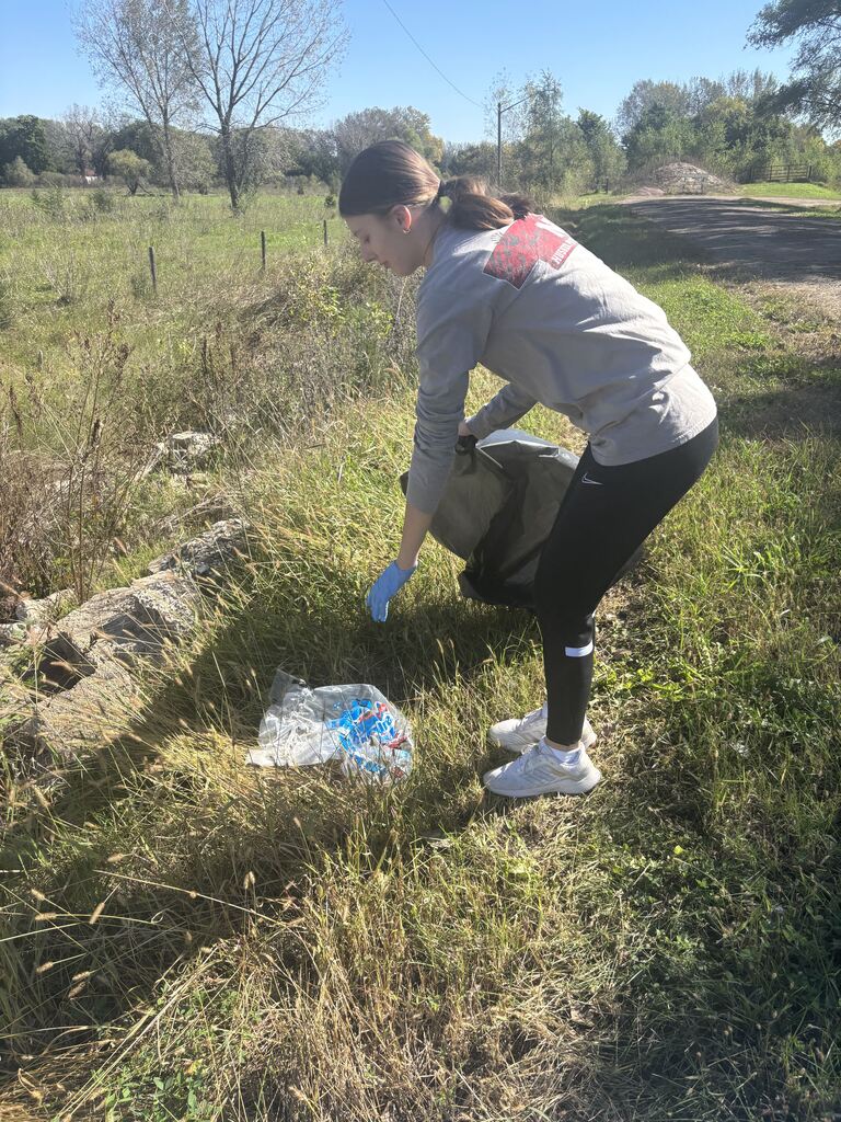 Kaylee and Abryelle picking up garabe in the Ewing, Clearwater and Orchard area as part of the Go Green Ribbon Project for FBLA