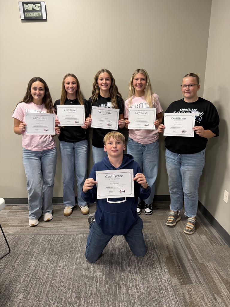 group of students with certificates