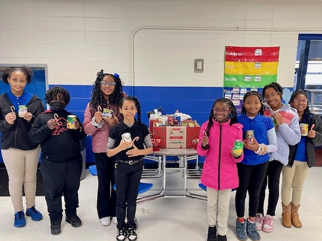 LJHS Peer Helpers with caned food and candy cane