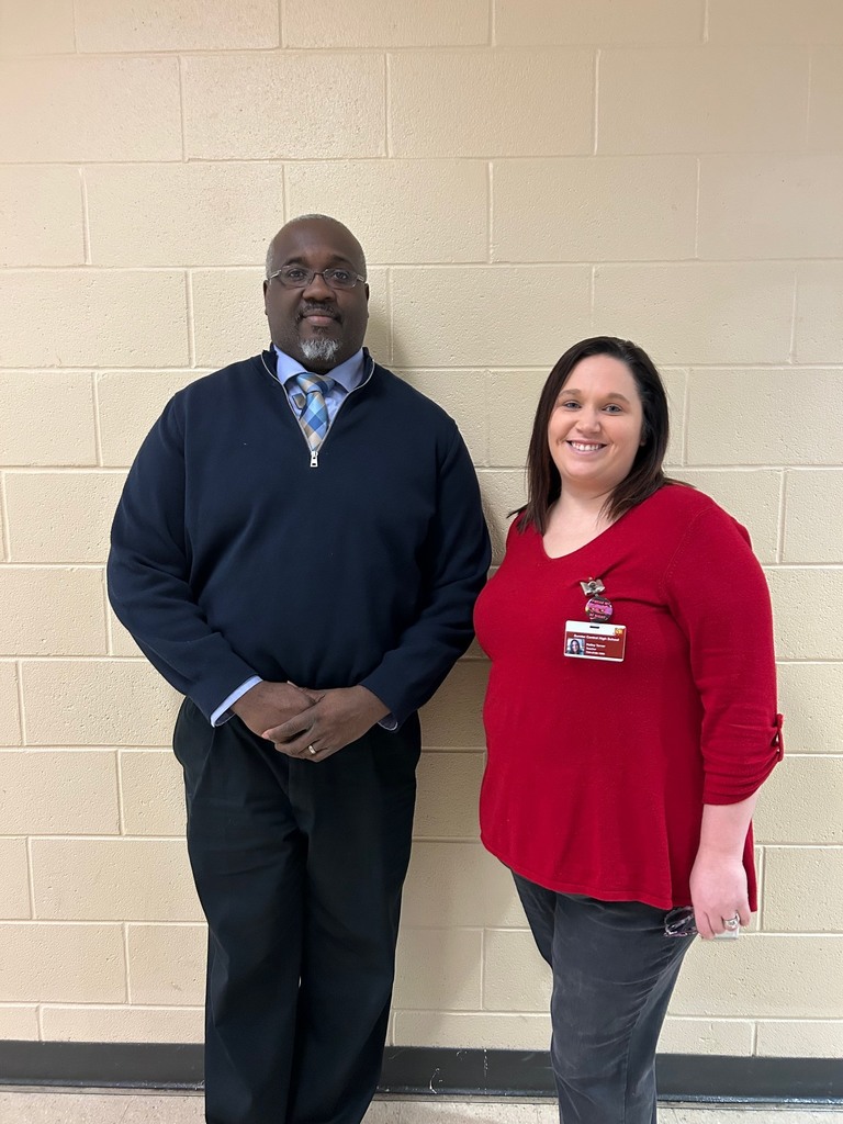 Principal West pictured with Golden Apple Award Recipient
