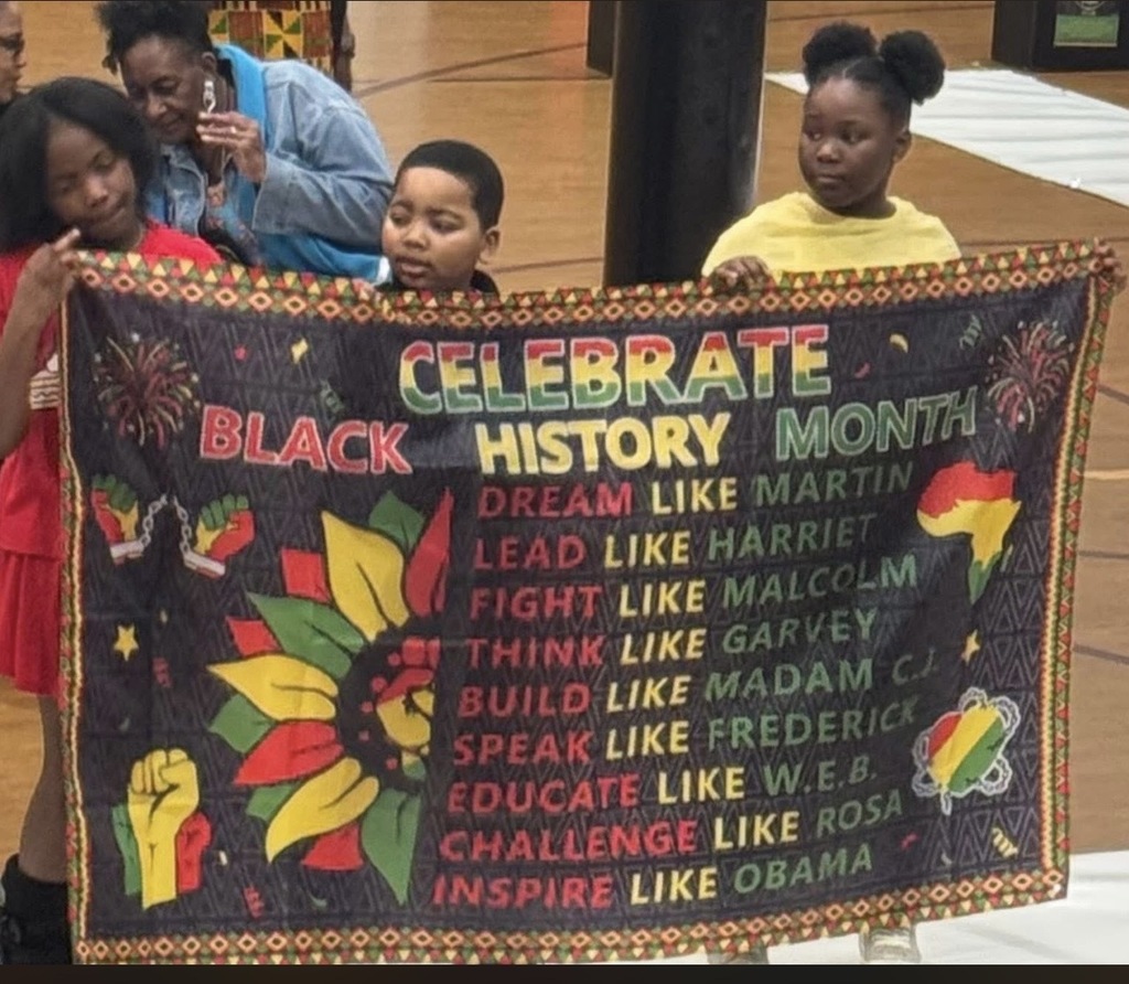 Students presenting in gym at YWE