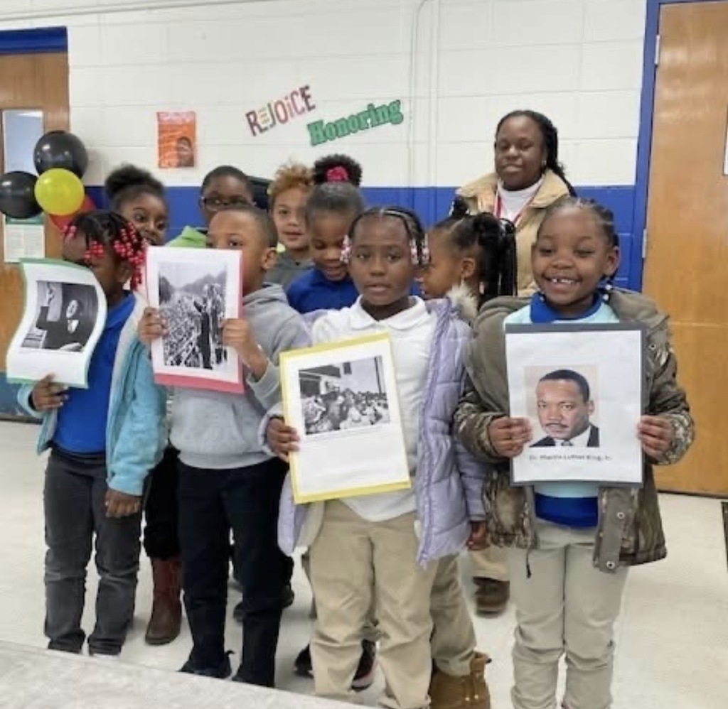 Students presenting in gym at LJHS