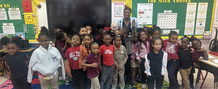 YWE kindergarten students and the superintendent 