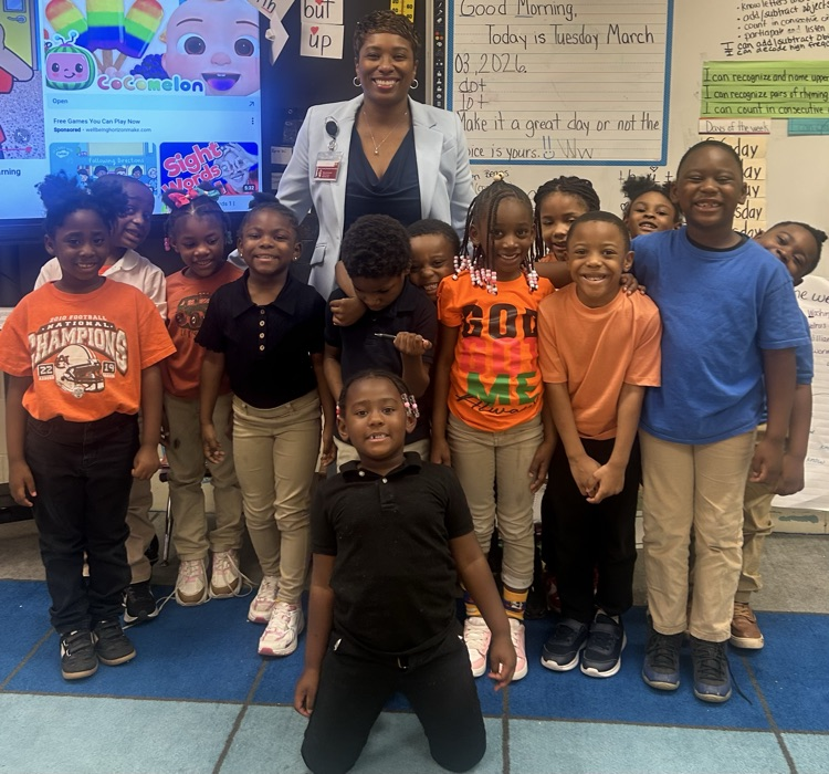 LJHS kindergarten students and the superintendent after reading 