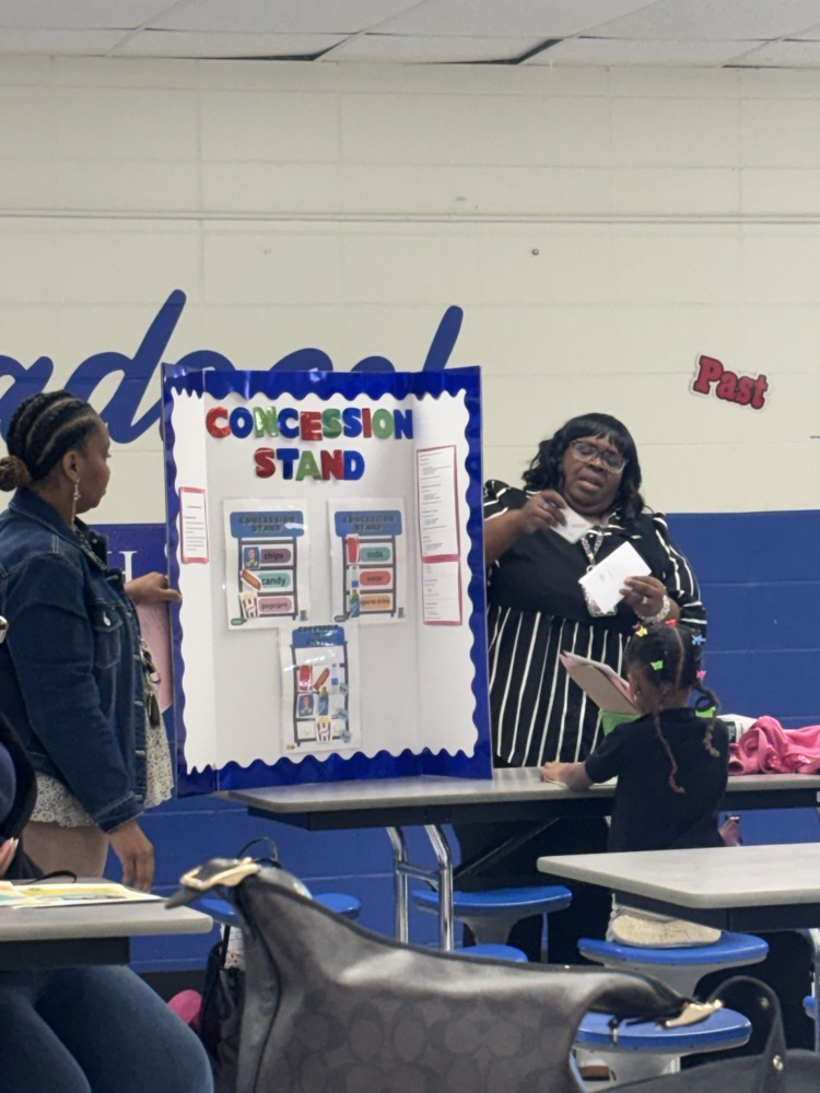 2nd grade’s game “Concession Stand” was used as a visual model to demonstrate addition.