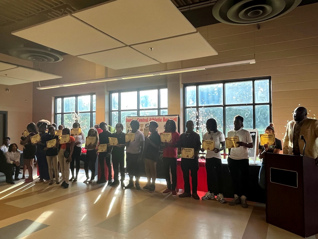 A series of photos from the Sumter Central High School Athletic Banquet held on May 4. Student-athletes stand in groups inside a decorated banquet hall while receiving awards, medals, plaques, and certificates for their athletic achievements. Coaches and presenters speak from a podium as students pose for recognition photos. Decorations include red and black table coverings, sports-themed displays, footballs, banners reading “Sumter Central Athletic Banquet,” and lighted decorative trees. The event celebrates student-athletes from multiple sports programs at Sumter Central High School.