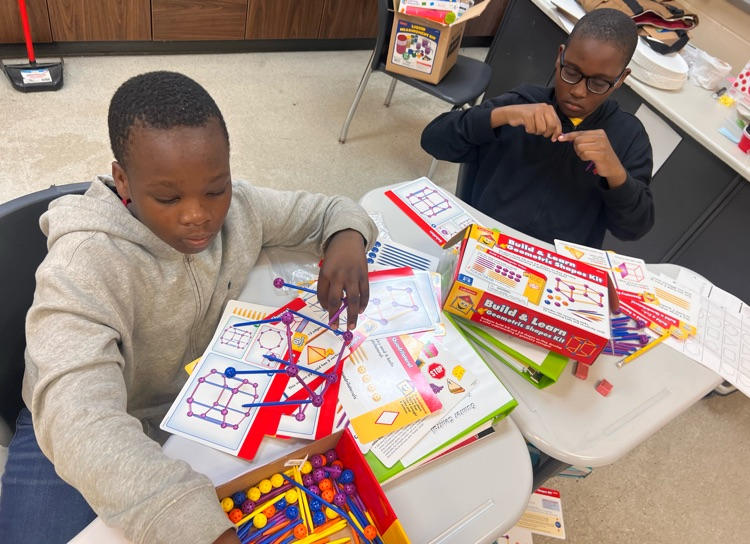 students building an object