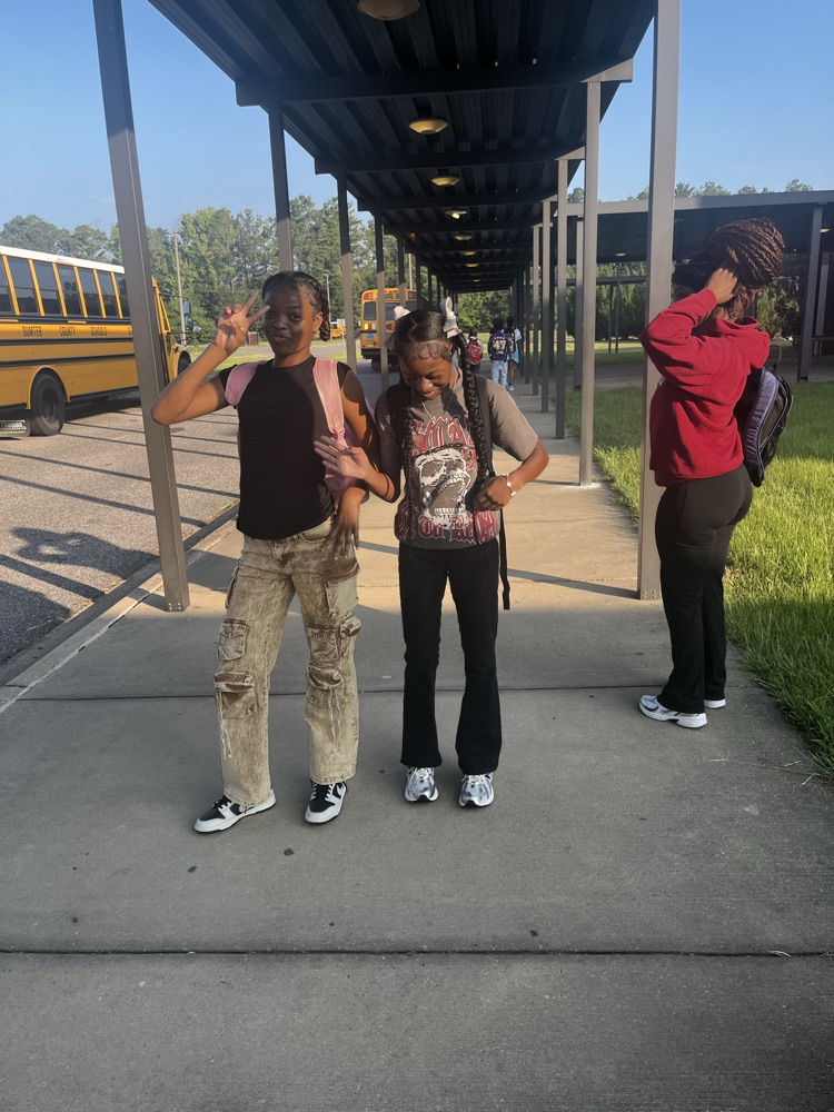 students at bus