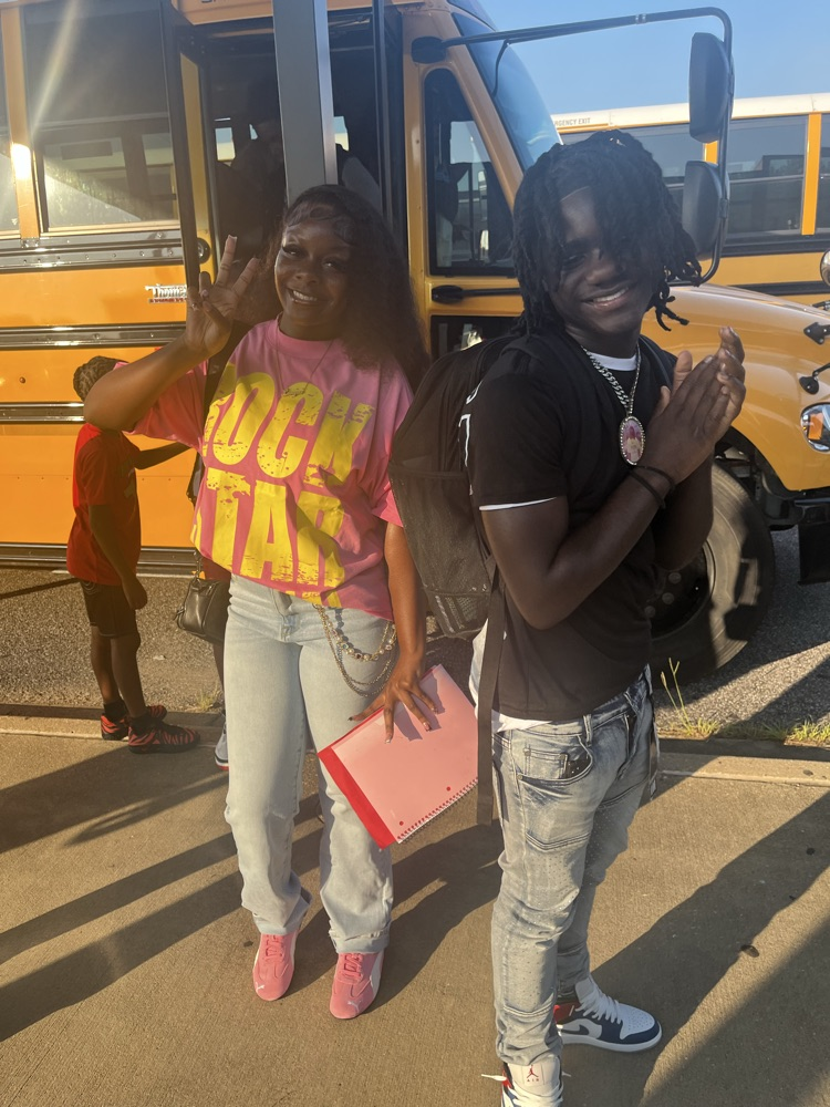 students at bus